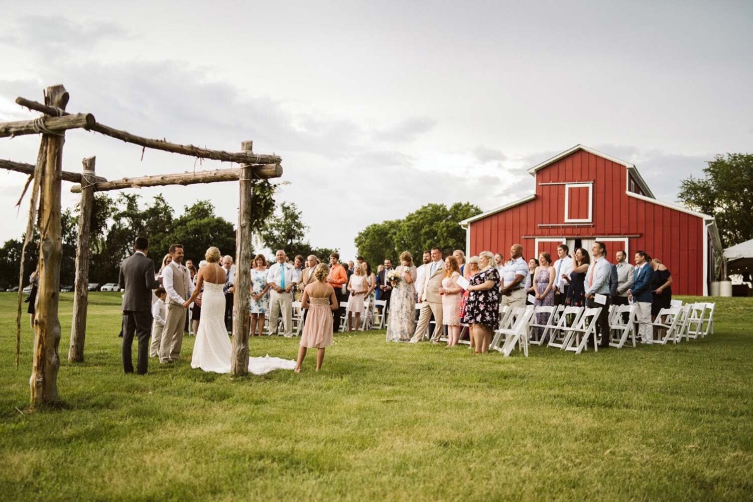 A wedding ceremony beside the Virginia Barn